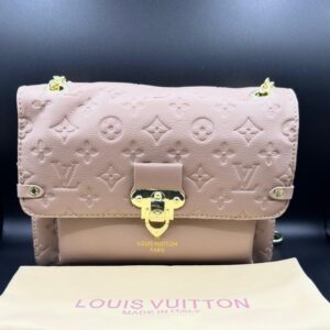 louis vuitton vavin pm tobacco tan empreinte leather shoulder bag