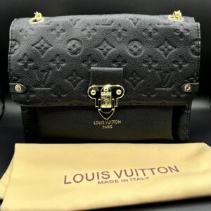 louis vuitton vavin pm shoulder bag in midnight black empreinte leather