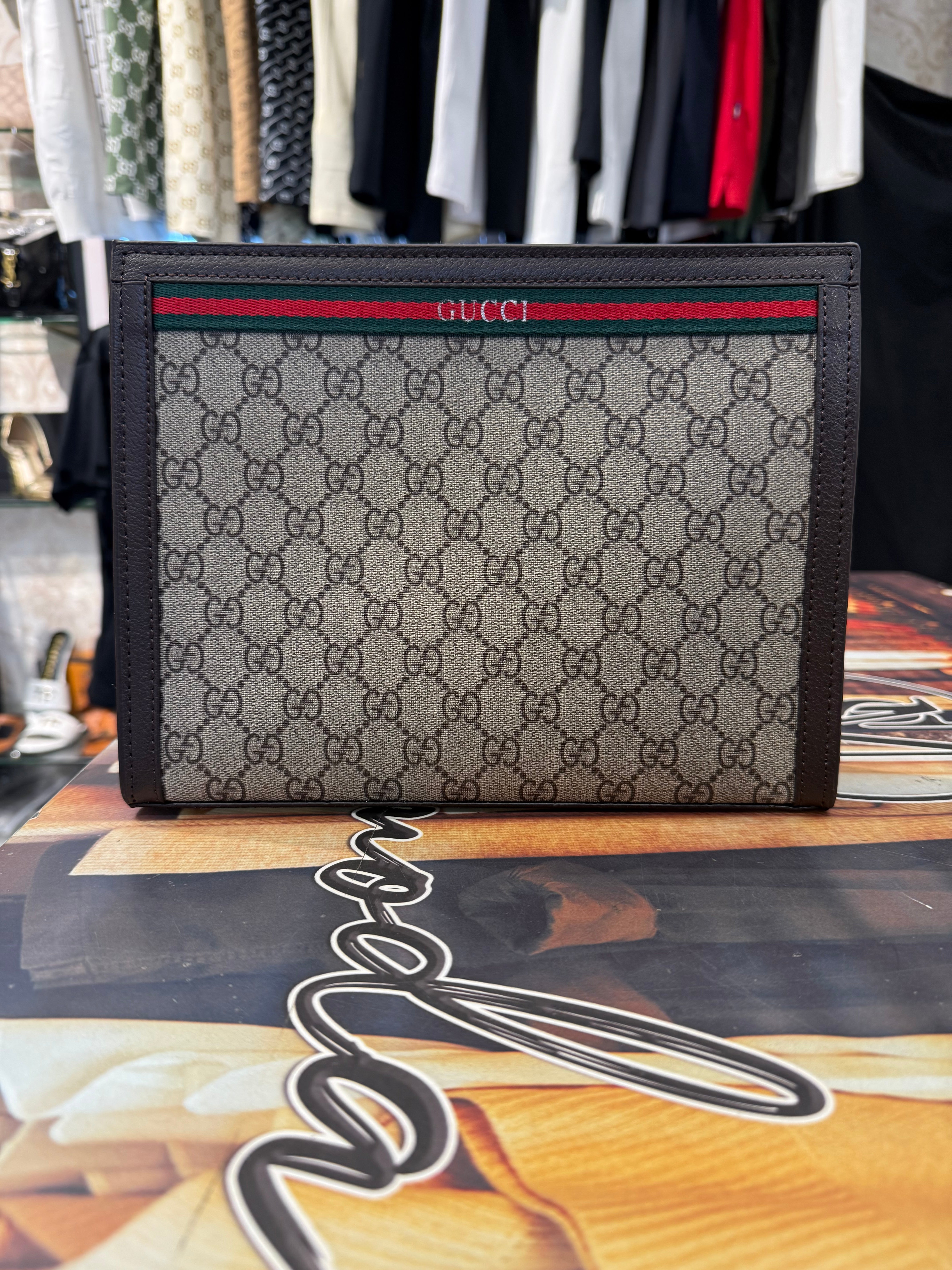 grey & black checkered hand pouch